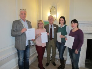 Dragoljub, Nada, Zeljka and Ena receive their certificates from Peter Tyrer at the end of their training 